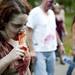Second year participant and Ypsilanti resident Reed Fannin gnaws on a fake foot in the 2012 Ann Arbor Zombie Walk on Saturday. The event is an international fundraiser that uses the zombie apocalypse as a "worst case scenario". Daniel Brenner I AnnArbor.com